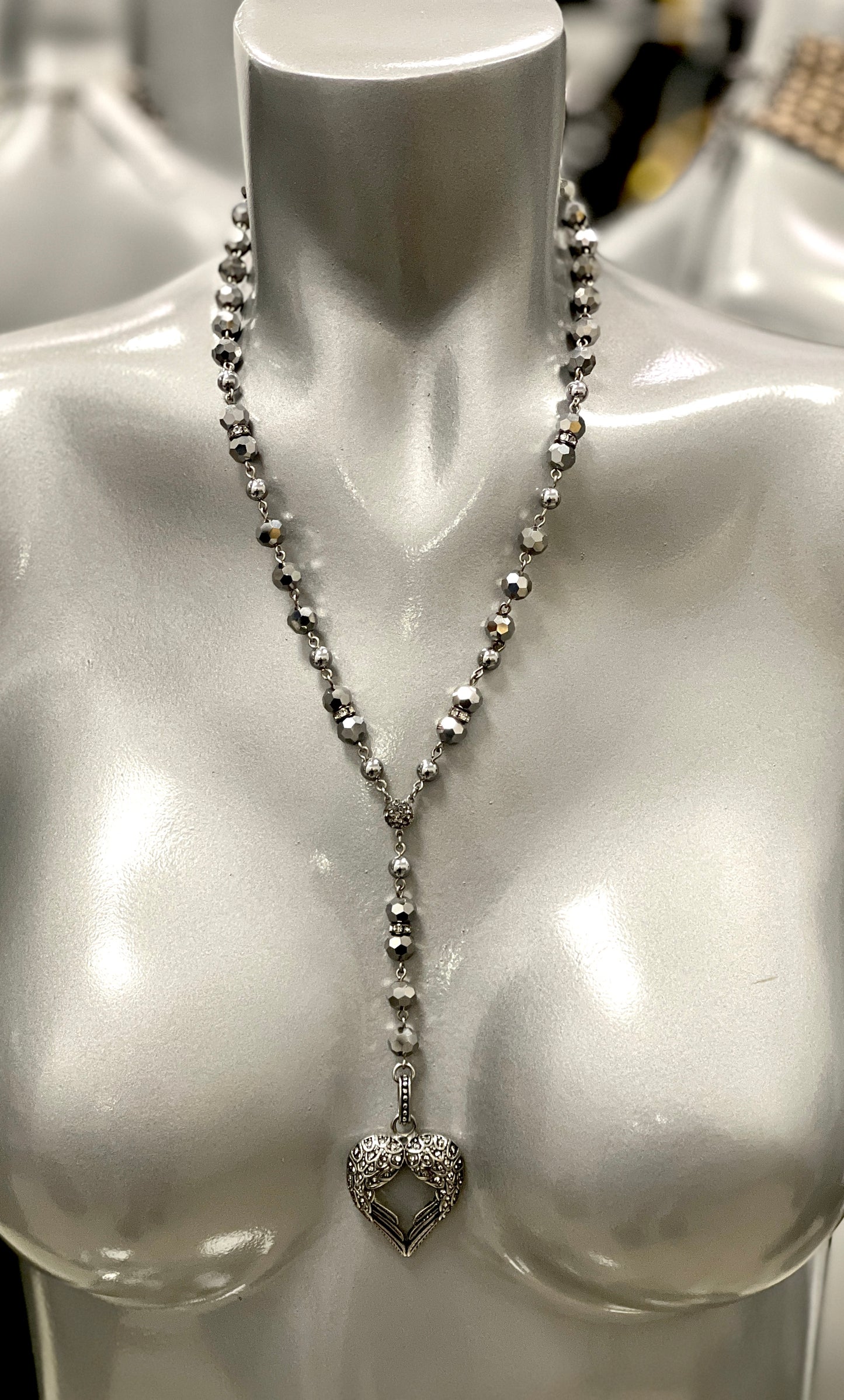 “Sacred Wings” in Gunmetal